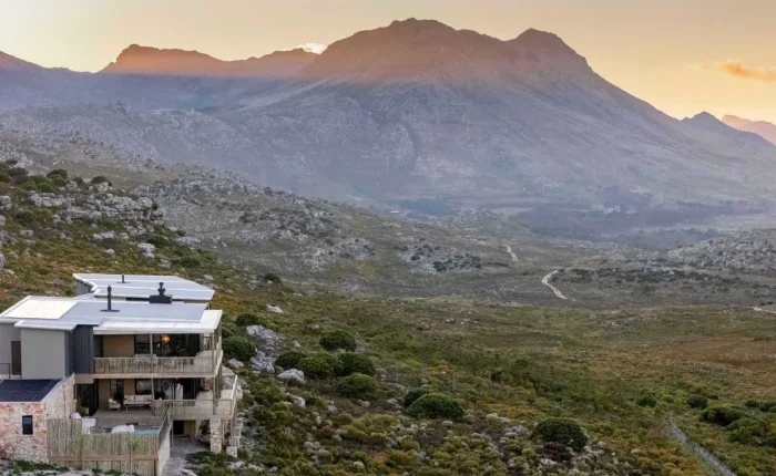 Hideaways Cape Point private villa overlooking fynbos landscape and mountains at sunset